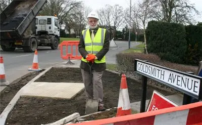 Bill Lewis inspecting dropped curb installation